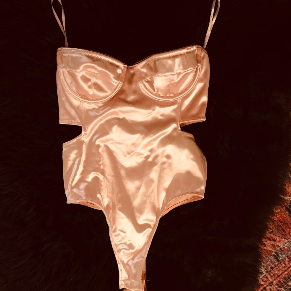 XS OUT FROM UNDER CUTOUT BUSTIER BODYSUIT